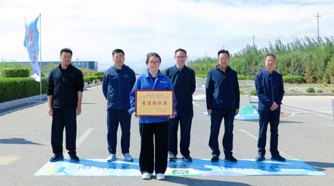 新能源公司組織職工參加武威涼州工業(yè)園區(qū)“匠心向黨 步履不?！甭毠そ〔阶呋顒?dòng)